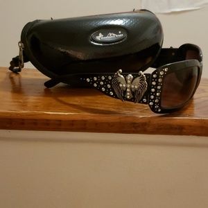 Cross and wing sunglasses